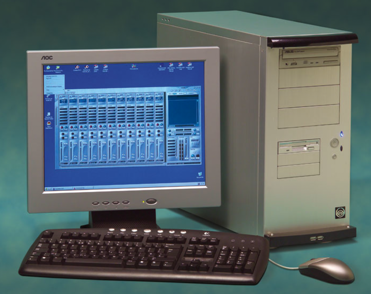 A late-1990s desktop computer: CRT monitor, beige tower, keyboard and mouse